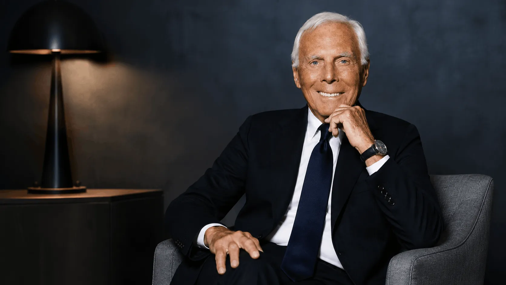 Giorgio Armani net worth and fashion legacy at a runway show